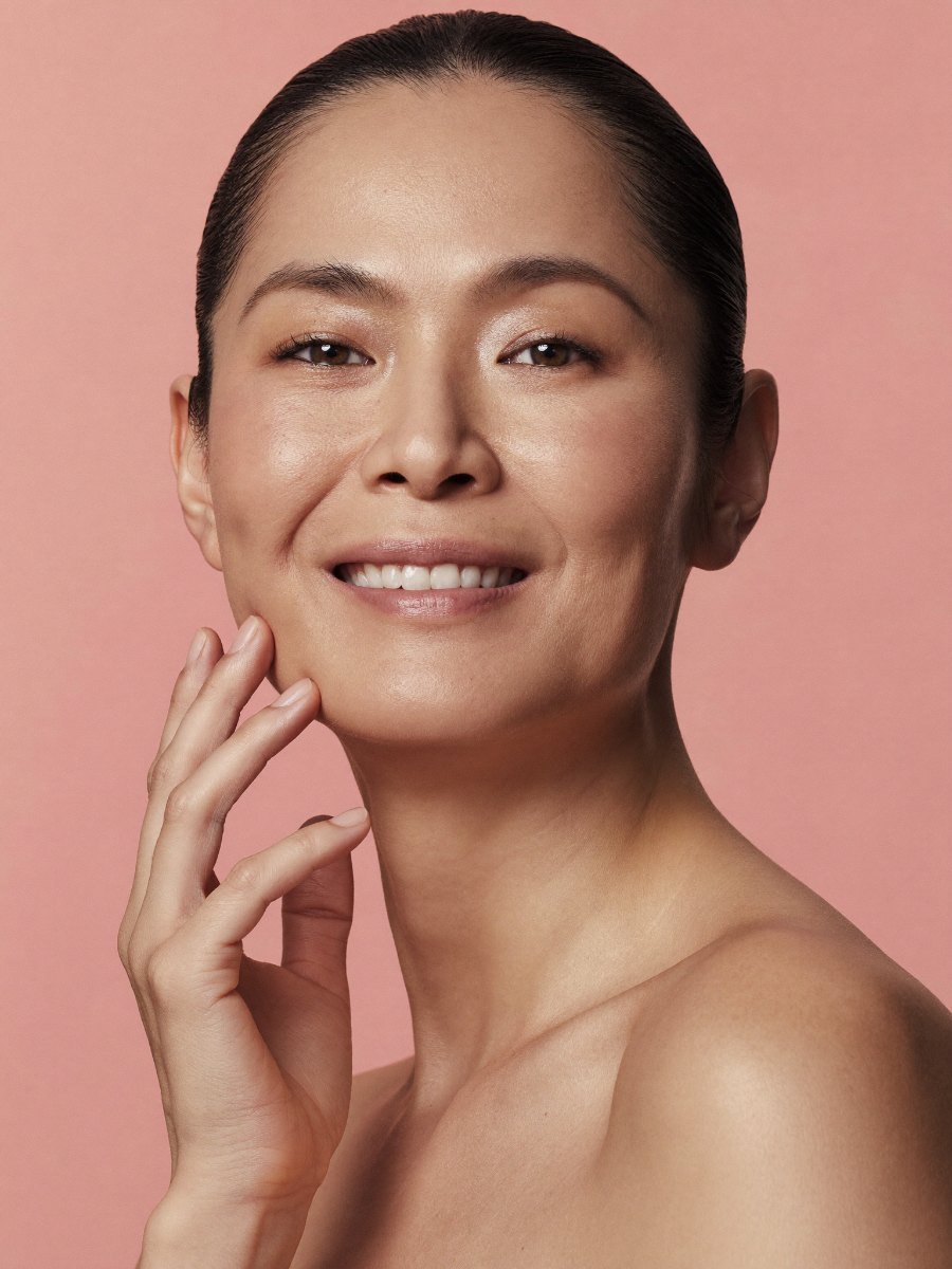 Woman with smooth, natural-looking forehead after Botox treatment at Dr. Rochelin Aesthetic & Wellness